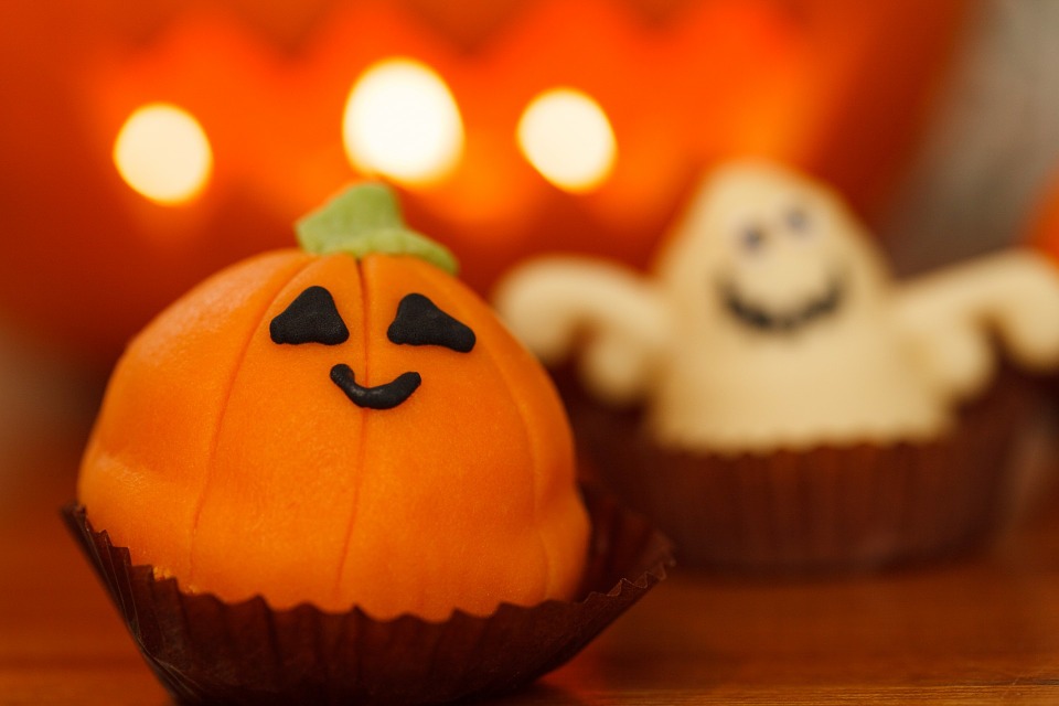 A pumpkin and a ghost muffin